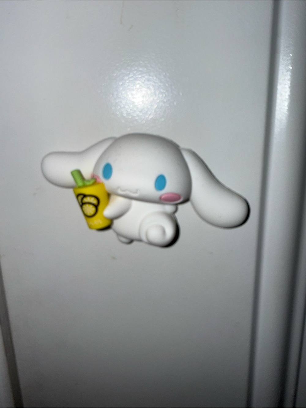 Cinnamoroll fridge magnet with white bunny holding a yellow cup with a green str
